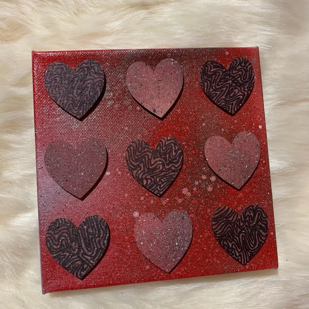 HANDMADE RED AND BLACK HEART ARTWORK ON CANVAS